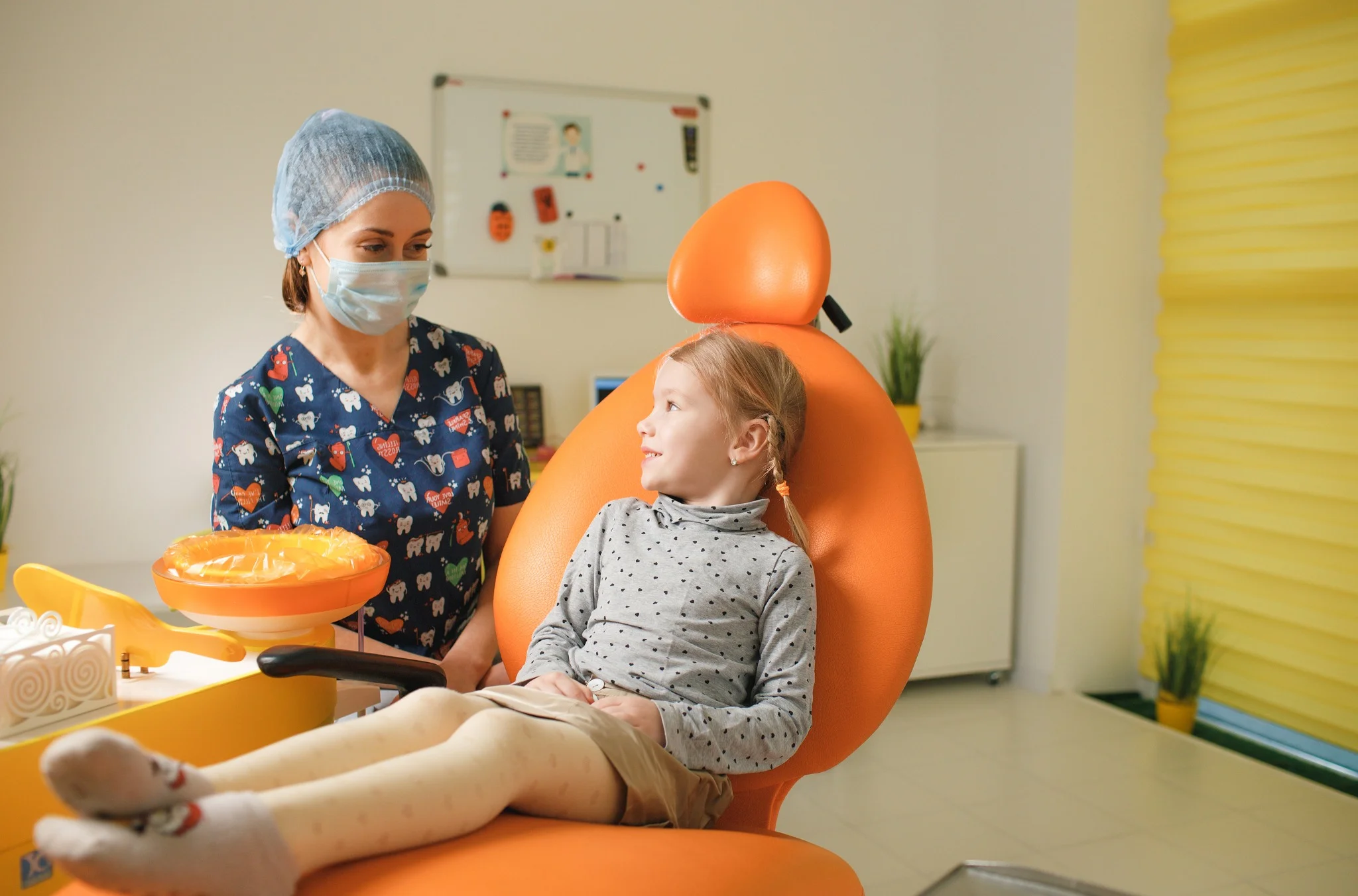 Dentist Twin Falls ID Female Pediatric Dentist Interacting With Young Patient