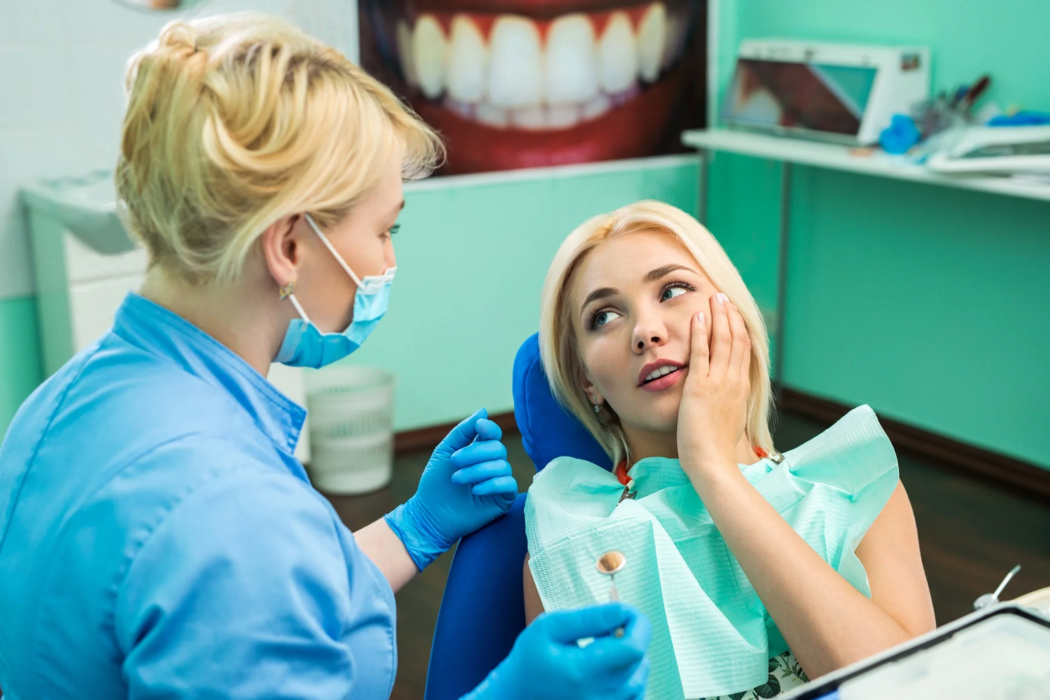 Dentist Twin Falls ID Woman Explaining Tooth Pain To Dentist